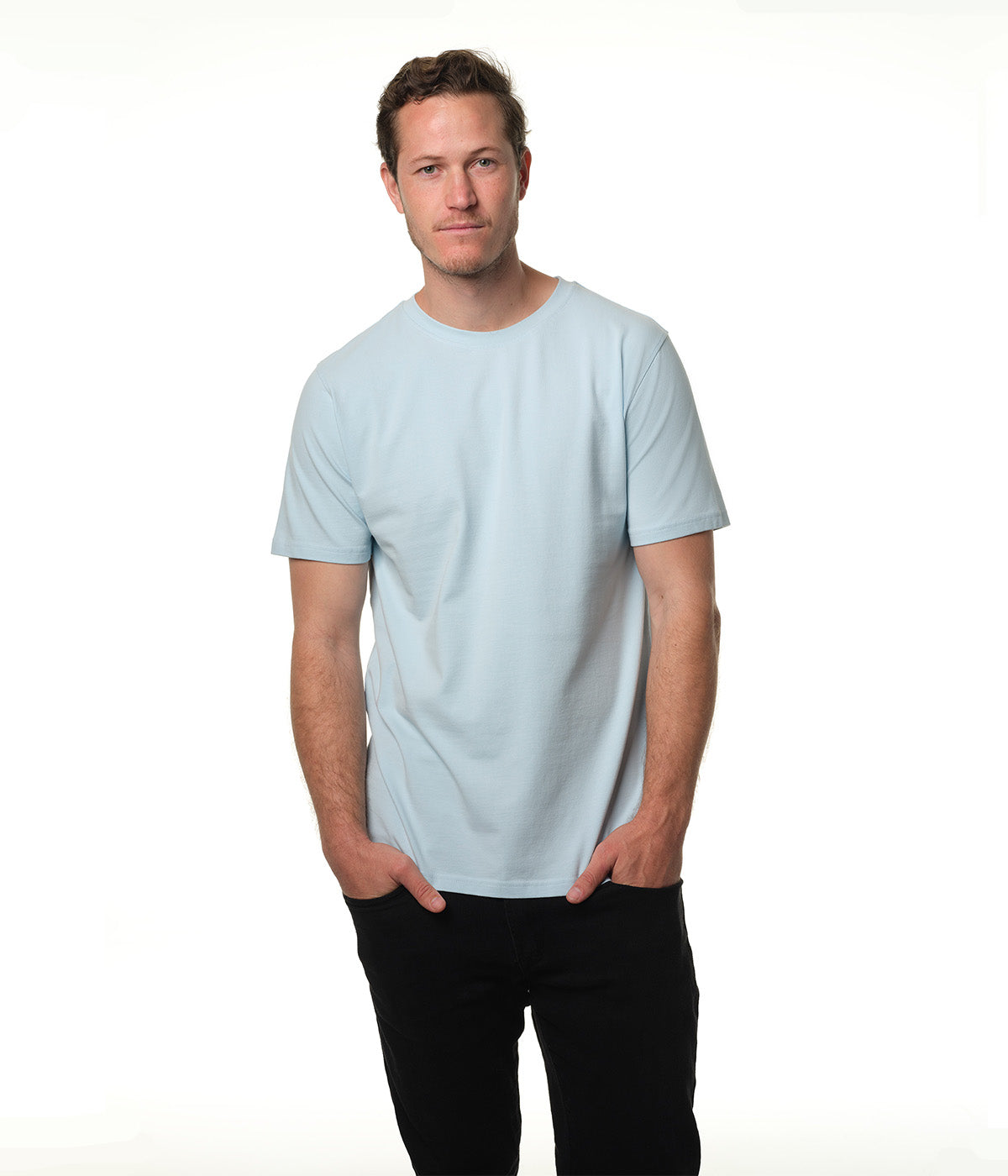 Male model wearing our "breakwater" light blue t-shirt.