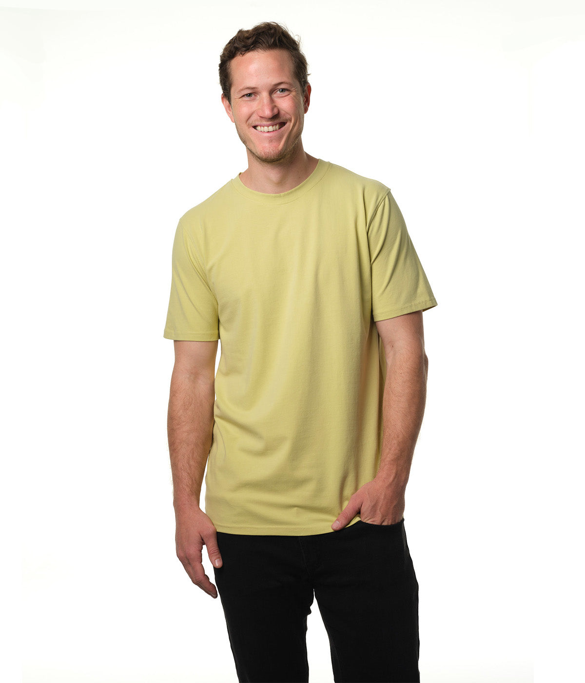 Male model smiling wearing our "light moss" green t-shirt