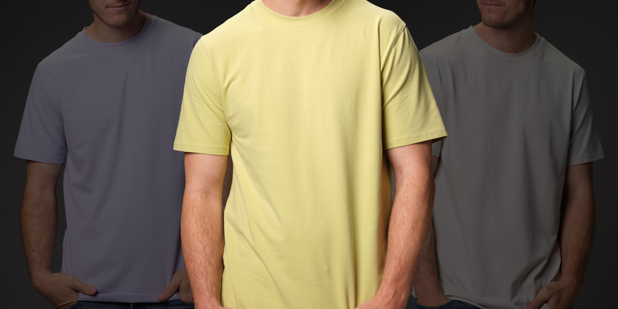 Male model wearing our "light moss" premium green t-shirt with "lilac sky" and "ash" shown muted in background