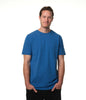 Video of male model entering screen from left wearing our "azure" blue t-shirt pausing center screen turning then exiting screen right