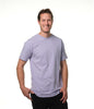 Video of male model entering screen from left wearing our "lilac sky" light  purple t-shirt pausing center screen then exiting screen right